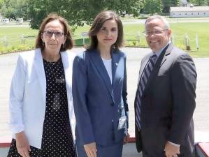 Photo Caption: Orange County Health Commissioner Dr. Irina Gelman (center) with State Supreme Court Justine Sandra Sciortino and Orange County Court Judge Craig Brown, the OCBA’s newly sworn in president, at the Goshen Historic Track on June 23. Photo provided by Orange County.