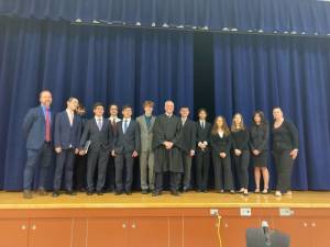 Attorney Bruce Schonber (left) with the Chester UFSD Mock Trial team in March.