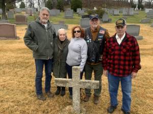 Ron and Maggie Nelson, Joanne Bamond, Christopher Holshek, and Paul Bamond restored the gravesite of Marine Sgt. James R. Ruppert, killed in action in Vietnam in 1971, at Saint Columba Cemetery in Chester.
