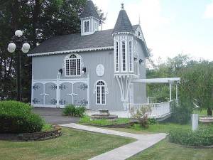 The remodeled Carriage House in Victorian style on the Novellino property.