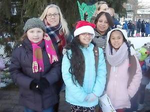 The tree lighting ceremony was a great time for friends to get together and welcome the holiday season. Pictured are Kelsey Fitzpatrick, 8, and her mom, Jennifer; Gabriella Gonzalez, 9, and her mom Janet. With them is their friend, Leah, 8. The girls are all in Brownie Troop 487 in Goshen. They came to sing holiday favorites like “Jingle Bells and “Frosty the Snowman.” Recently they enjoyed entertaining residents with holiday carols at Valley View Nursing Center.