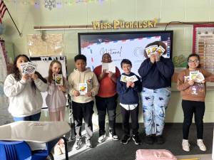 Chester students proudly display their cards for local seniors.