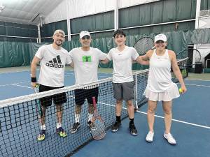 Shepard Hoffman poses with fellow tennis enthusiasts at the Serve for a Cause event, including tennis pro Anat Stein (Right), who has participated in the US Open and the Israel Davis Cup team, as well as the Olympics representing Israel.