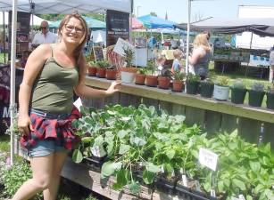 Vendor Sarah Jane Gailie with Twin Ponds Greenhouse offered home gardening veggies, like tomato, lettuce and pepper plants. Photos by Geri Corey.