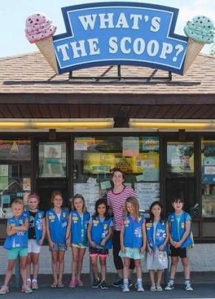 Daisy Troop 88 learned about women in business from the owner of What's the Scoop, Kristen Mulroe.