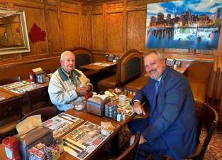Jim Murphy enjoys breakfast with DA David Hoovler.