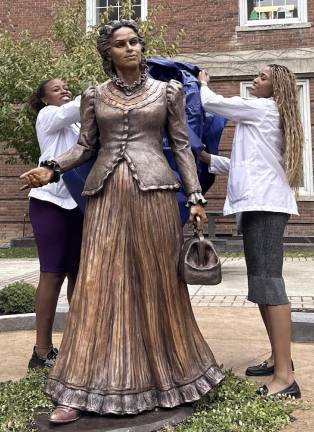 SUNY Medical Students unveil the bronze sculpture of Dr. Loguen Fraser, the first African American woman to graduate with a medical degree from SUNY.