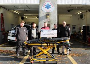 Pictured from left to right at the Blooming Grove Volunteer Ambulance Corps building in Washingtonville are: BGVAC riding members George Icobelli and Tahir Ayala, state Sen. James Skoufis, First Lieutenant John Hastings and Chief Brian Bates. Provided photo.