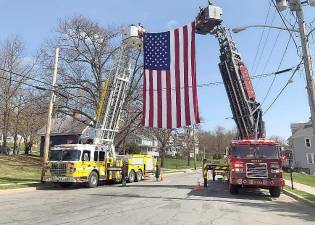 Firefighters with the Warwick Fire Department T-633 and with the Monroe Fire Department T-538 attend funeral services for former Chester Fire Chief Joseph Verbert Jr., who passed away on Tuesday, April 6, at his residence in Chester. He was 91 years old. He was a member of the Walton Engine &amp; Hose Co. for 73 years. He also was fire commissioner for Chester Fire District and Orange County Fire District 9 coordinator during his years of service. Photo provided by the Warwick Fire Department.