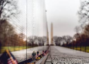 The Vietnam Veterans Memorial (also known as the Wall) in Washington, D.C. Photo by Caleb Fisher on Unsplash.