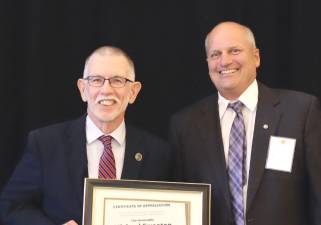 Former Warwick Town Supervisor Mike Sweeton with OCLT Board President Lewis Lain at the OCLT’s benefit reception in 2022.