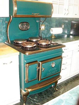 Replica of a Victorian style stove in the remodeled kitchen. All appliances are in