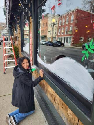 Chester Academy students decorate local shops with holiday scenes