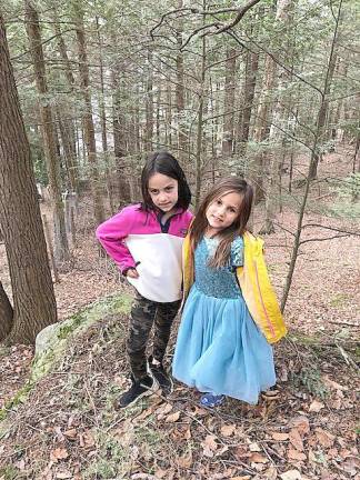 Arysa and Isla Reilly venture into the woods near their grandparents' home in Chester for a little fresh air.