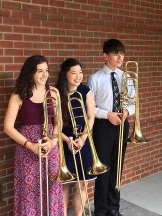 Angela Prictoe (left) with fellow trombonists at NYSSSA in Saratoga Springs this summer (Photo provided)