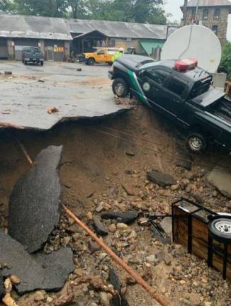 The ground at Bear Mountain State Park collapsed under a state Office of Parks Recreation and Historic Preservation vehicle at the maintenance depot. Photos provided PBA of New York State.