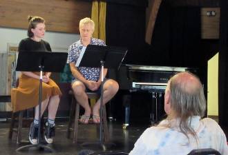 Actors Fiona Hill and Keith Dougherty read from their scripts as director Paul Ellis looks on (Photo by Ginny Privitar)