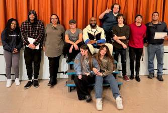 Pictured in back, from left to right are: Fabienne Justin, Emmanuel Stevens, Andrea Bierria, Jenny Ching, Chandler Mac, Patrick Dougherty, Spencer Conti, David Mosca and Rob Payen; and in front, from left: Polina Grebenchikova and Mishel Grebenchikova. Provided photo.