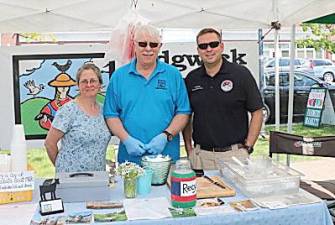 Orange County Executive Steven M. Neuhaus with Dan and Talitha Jones of Edgwick Farm in Cornwall, one of the approximately 9,000 small businesses in Orange County.