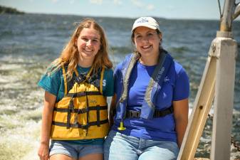 New York Sea Grant intern Krystal Dixon, left, a Cornell University environment and sustainability major, with New York Sea Grant Great Lakes Fisheries and Ecosystem Health Specialist Stacy Furgal along Oneida Lake.