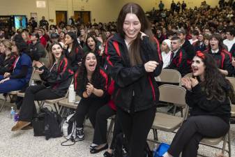 OUBOCES student Lea Quinn (Monroe-Woodbury) heads to the stage to receive her first-place medal in Esthetics.