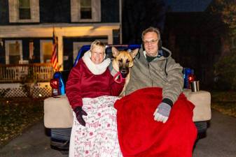 Locals watch the Holiday Light Parade in Chester, NY. Photos by Sammie Finch