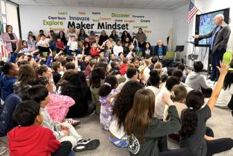 Chester Elementary students welcome author Eric Luper.