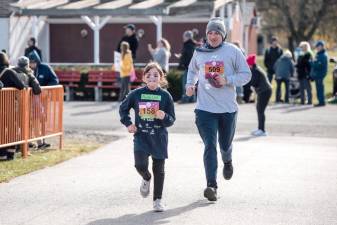 Angie Szabo and her dad Tom Szabo running the 5K