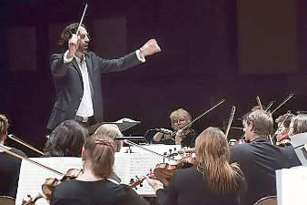 Music Director Russell Ger leads the Greater Newburgh Symphony Orchestra in concert. Photo by Mimi Estes.