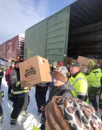 Operation Toy Train rides through town