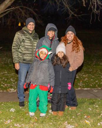 Families watch the Holiday Light Parade in Chester, NY. Photos by Sammie Finch