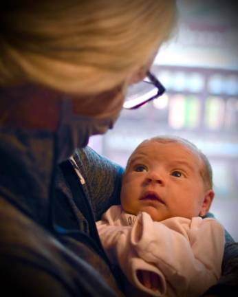Though the big family Thanksgiving in the city is off, “I’m feeling wonderful, are you kidding me?” said Terry Balton of Milford, Pa. She is planning instead to take a Covid test and “bubble” with her new granddaughter. (Photo by Ryan Balton)