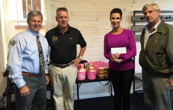 The Knights of Columbus #1106 recently donated $500 to Pedal Fitness Center in Goshen to support its aid for breast cancer patients .Pictured from left to right are: Ken Tschan, Grand Knight John Paulus, Cindy Waltzer and Ken Newbold. Provided photo.