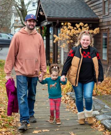 The Mayer Family walk through town as during their visit to Sugar Loaf.