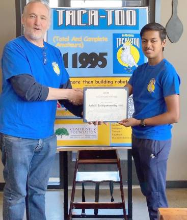 Coach Paul Woods presents Ashok Sathiyamoorthy his FIRST Dean’s List Finalist certificate.