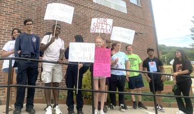 Tuxedo Union Free School District students show support for former school principals Roy Reese and Dolores Terlecky, before the June 21, 2023 school board meeting.