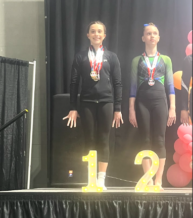 Madison Jennings of the Xcel Diamond team earned first place in the all around competition at Syracuse.