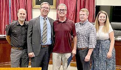 Village of Goshen Board members with retiree Theodore Lewis III at the Sept. 12 Board meeting. Left to right: Trustee Anthony Scotto, Trustee Chris Gurda, Ted Lewis, Mayor Scott Wohl, and Trustee Molly O’Donnell.