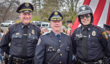 On April 14, Chief Watt, left, and Ptl. Hunt, right, attended the walk-out ceremony of retiring Town of Warwick Chief Thomas McGovern, center. Chief McGovern served the Town of Warwick for 43 years.