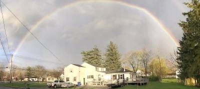 Reader Beth Quinn shared this image of a rainbow that appeared over this house at the corner of Fletcher Street and Oxford Road in the Village of Goshen following an otherwise dreary day.