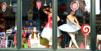 On Saturday, Nov. 27, shoppers along Main Street in the Village of Warwick were surprised to see that what appeared to be mannequins in the window of Fizzy Lifting Soda Pop Candy Shop were in fact dancers dressed in beautiful, festive costumes. Provided photo.