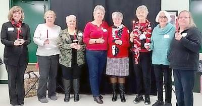 Warwick Valley Quilters' Guild's newly inducted officers (from left): Trish Herskee, Pattie Whelan, Irene Weiss, Janet Miller, Barbara Lindsell, Mary Kirchoff, Judy Veltidi and Eda Steinman.