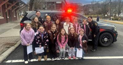 Girl Scout troop 598 gets a tour of the Village of Goshen Police Department.