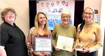 L-R: Rebecca Howard, collection curator, Harness Racing Museum &amp; Hall of Fame; Michelle Muller, head of Youth Services, Goshen Public Library &amp; Historical Society; Ann Roche, head of Local History, Goshen Public Library &amp; Historical Society; and Janet Terhune, director, Harness Racing Museum &amp; Hall of Fame.