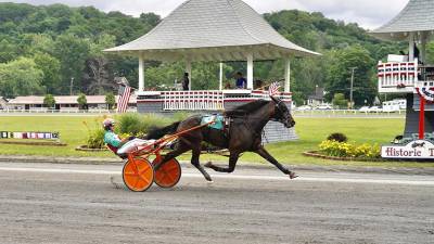 Jordan Stratton and Met Your Request cruising to victory at the Goshen Historic Track.