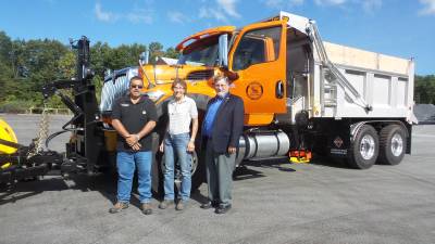 From left, with the town's new truck: Town of Chester Highway Superintendent Anthony LaSpina, Councilwoman Cindy Smith, and Orange County Legislator John Vero.