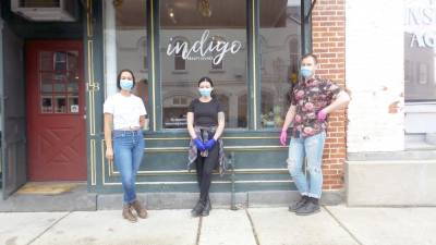 Indigo Beauty Lounge in historic downtown Chester is serving customers by appointment only while wearing masks. Pictured (from lefet): Nicole Pena, Ashley Lenahan and Robert Mahling.
