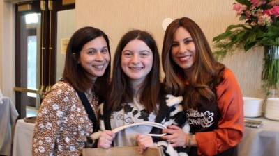 Mother and daughter Robin and Ruby Everly of Monroe, together with Chana Burston, enjoy baking Challah together at the Chabad of Orange County’s Mega Challah Babka Bake. Photos by Hailey Leonard, Senior, Washingtonville.