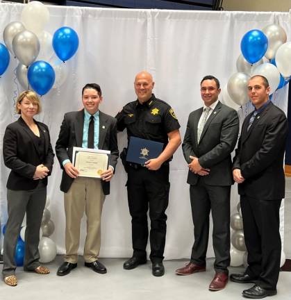 Chief Meredith McGovern of the Orange County Sheriff’s Office, Goshen sophomore Nicholas Cummings, Orange County Sheriff Paul Arteta, Deputies Luke Solomon and Joseph April at the Orange County Youth Bureau Awards on June 8, 2023.