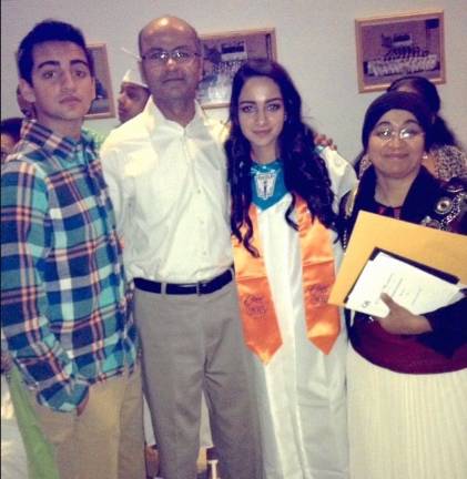 Wasil Ahmed (;eft) with his parents and sister (Photo provided)
